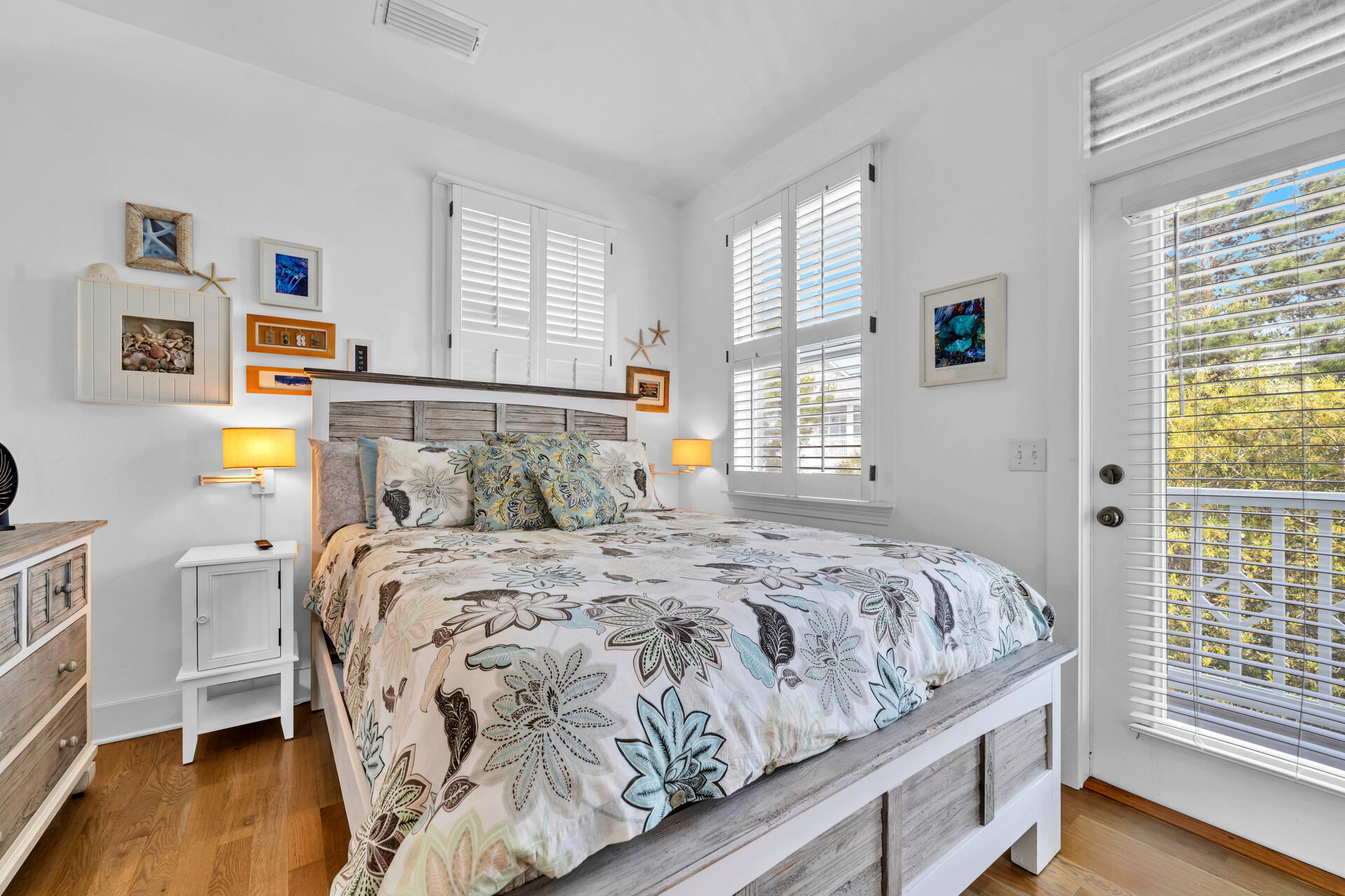 50 West Blue Crab Loop Inlet Beach, FL 32461 - Photo 54 of 67 a bedroom with a bed and wooden floor