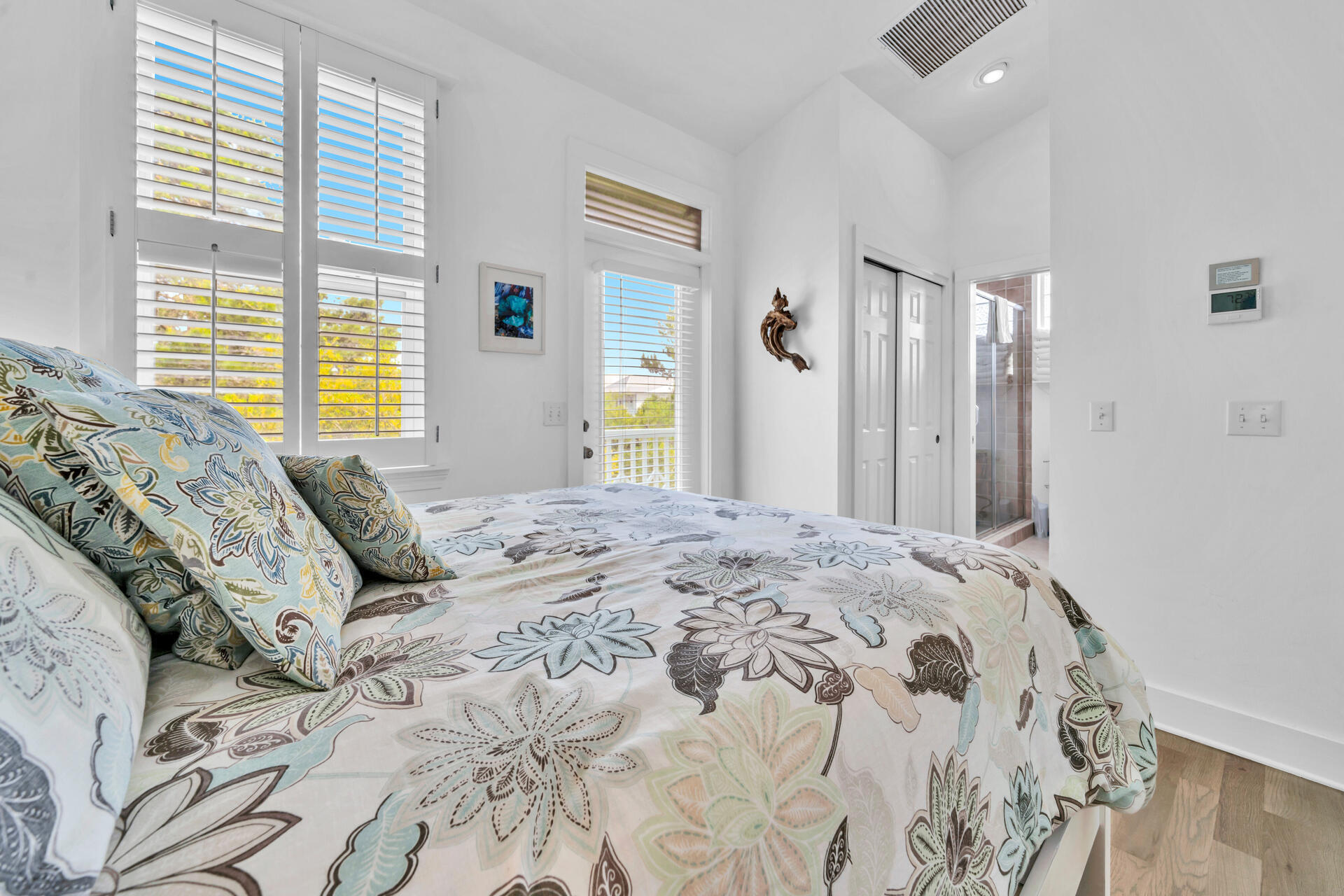 50 West Blue Crab Loop Inlet Beach, FL 32461 - Photo 55 of 67 a bedroom with a large bed and a window