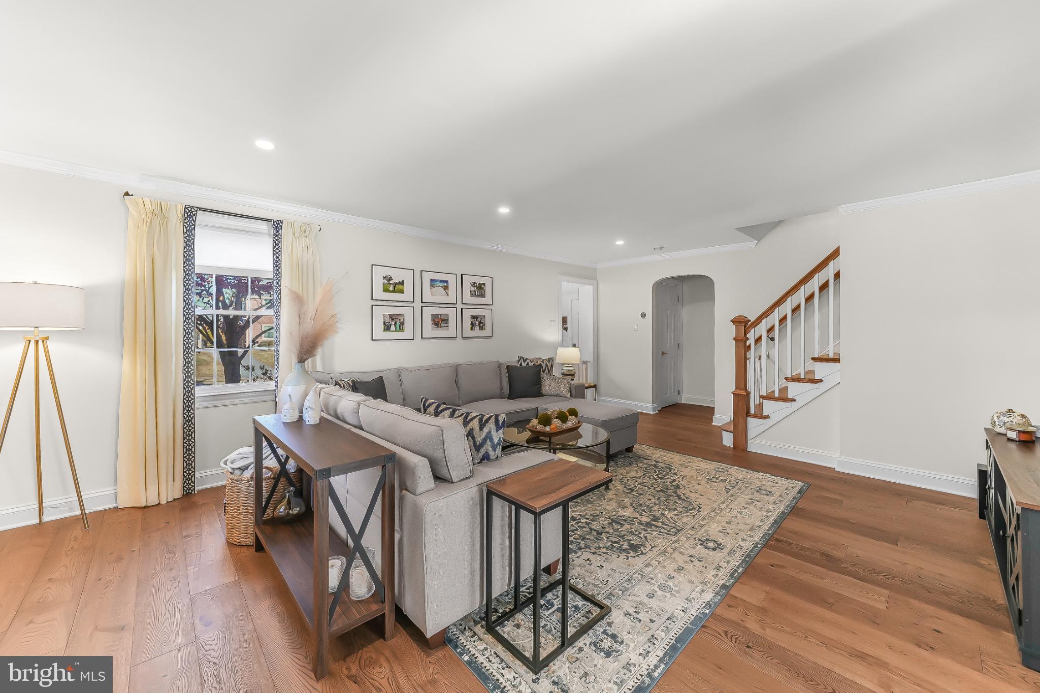 565 Kirk Road Springfield, PA 19064 - Photo 11 of 41 a living room with furniture and a wooden floor