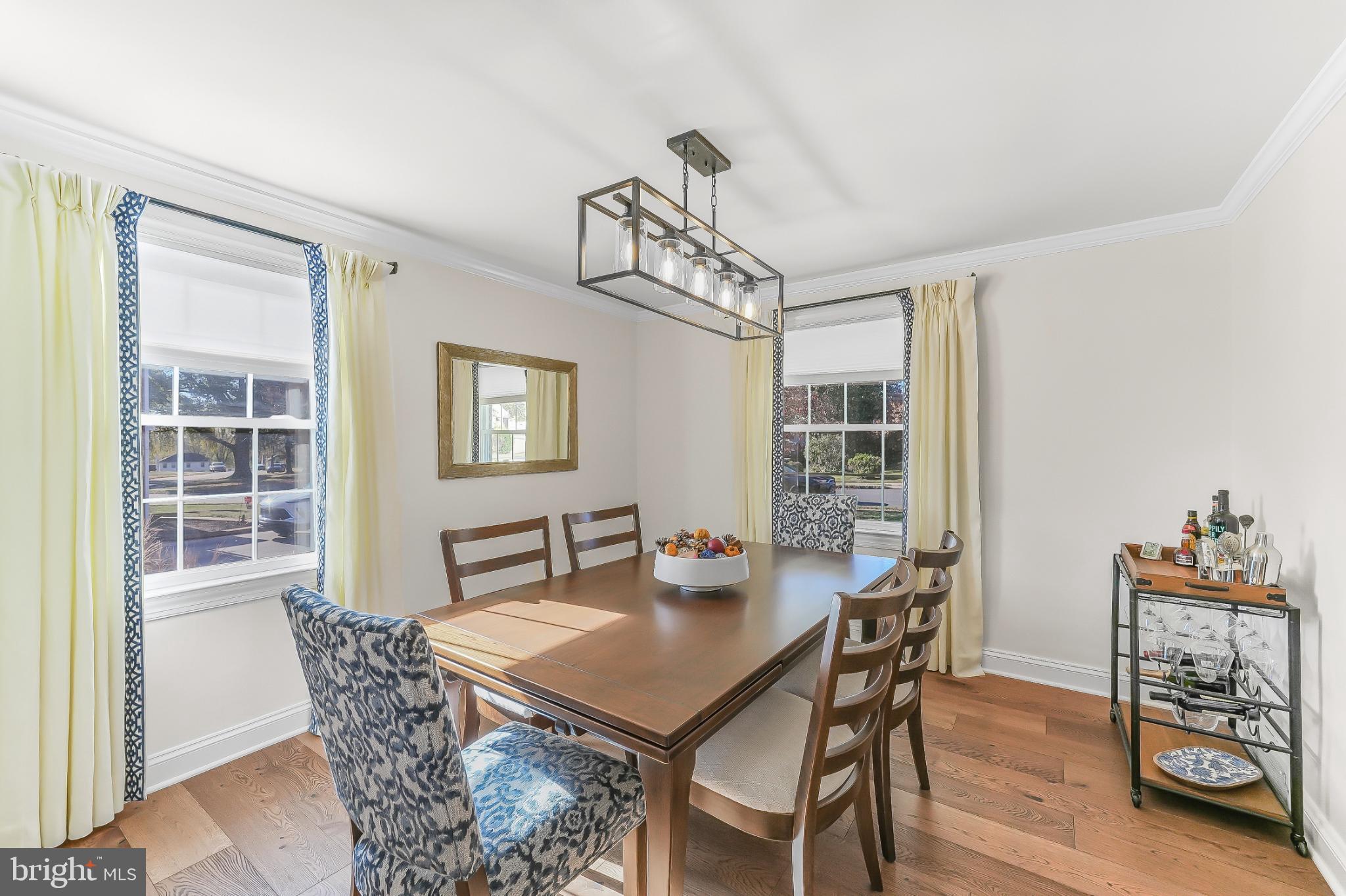 565 Kirk Road Springfield, PA 19064 - Photo 14 of 41 a view of a dining room with furniture window and wooden floor