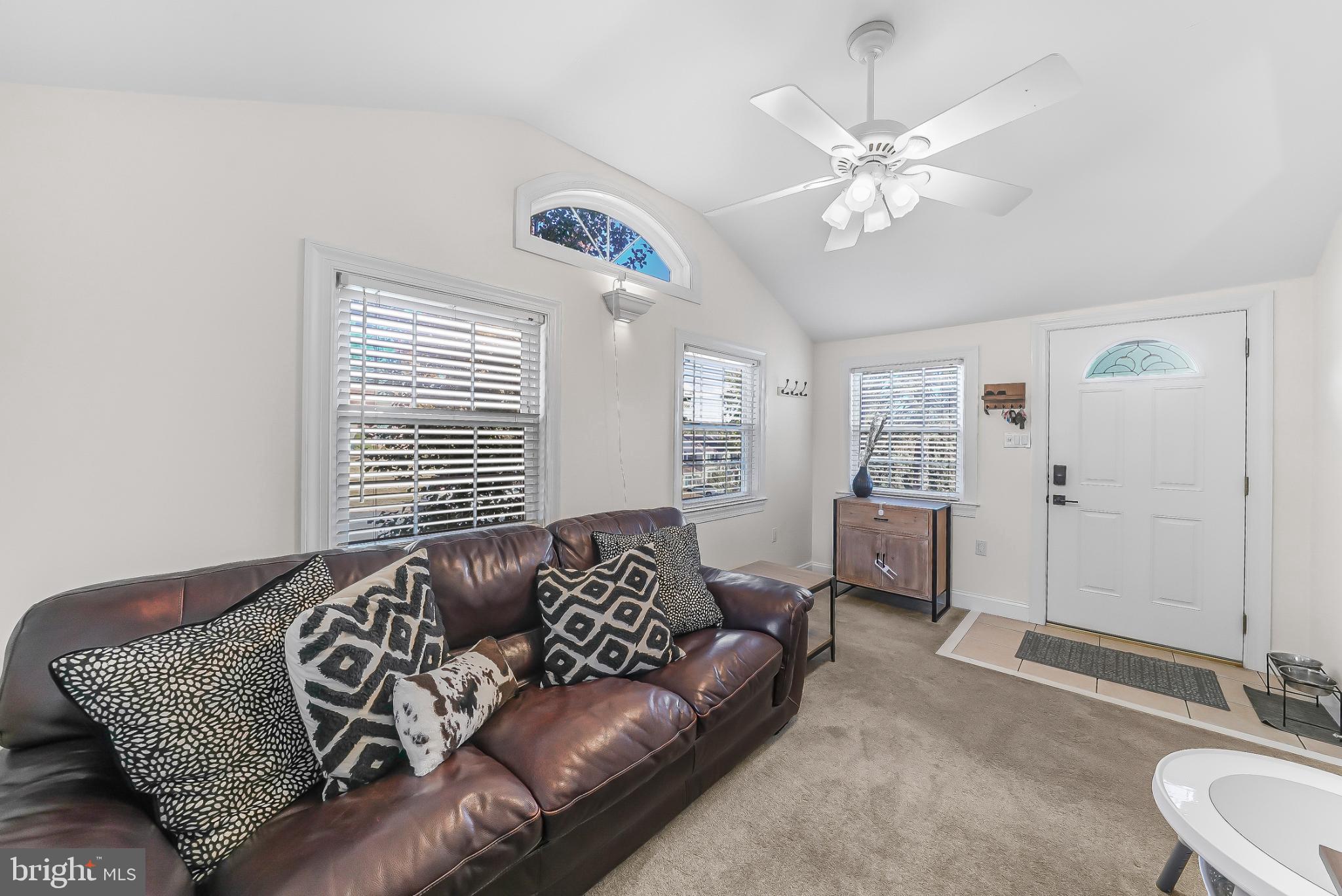 565 Kirk Road Springfield, PA 19064 - Photo 16 of 41 a living room with furniture and a large window