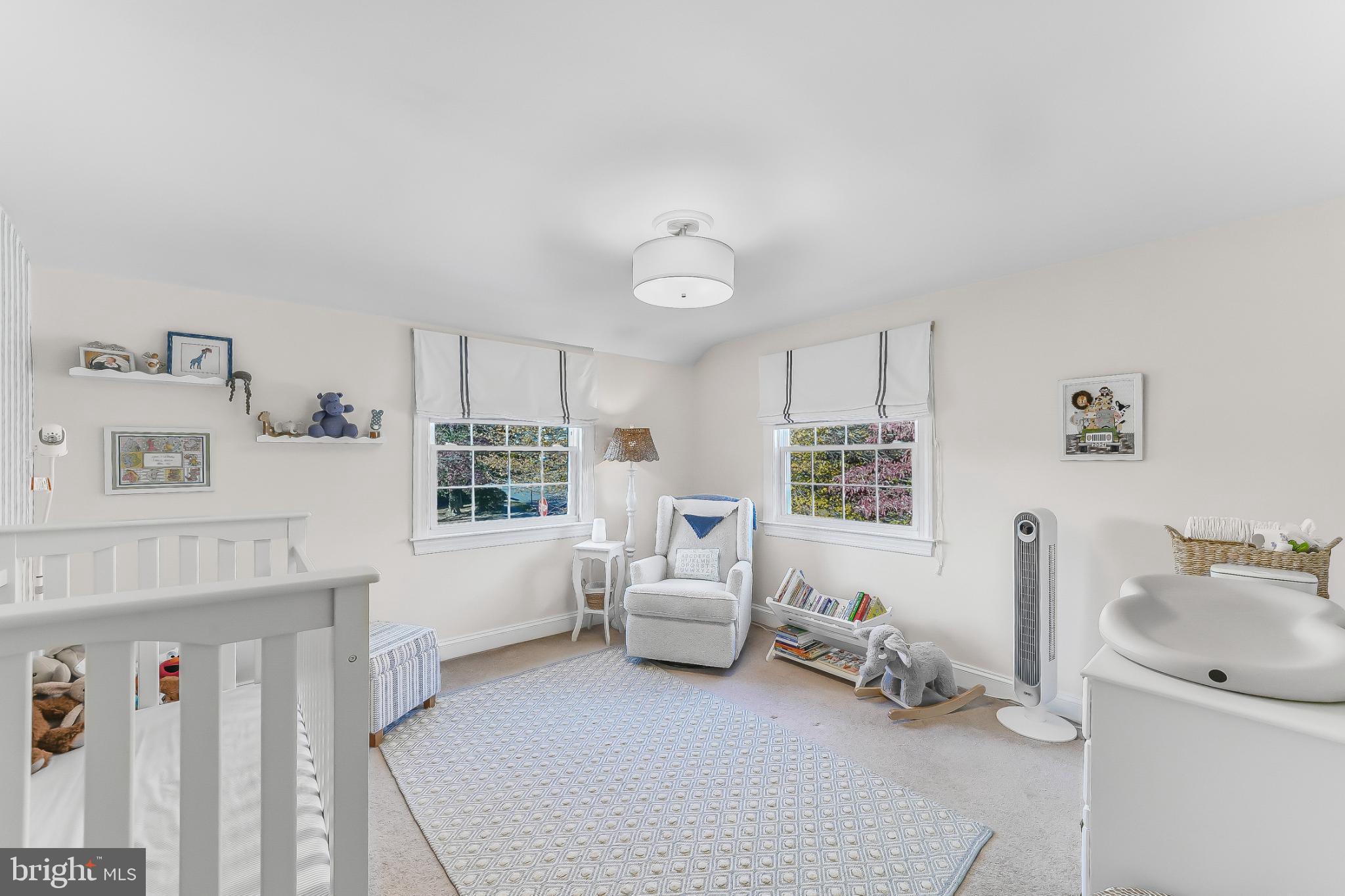 565 Kirk Road Springfield, PA 19064 - Photo 24 of 41 a living room with furniture and a window