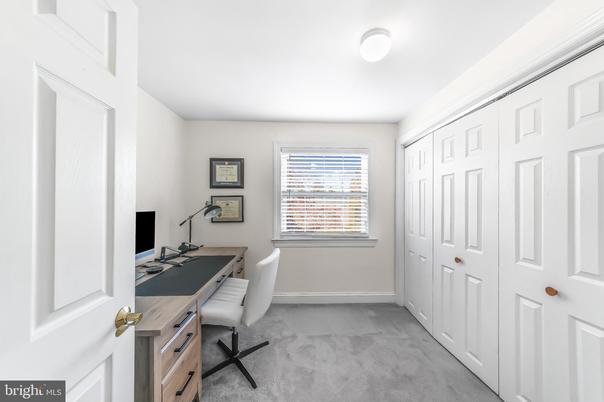 565 Kirk Road Springfield, PA 19064 - Photo 26 of 41 a view of a workspace with furniture and a window