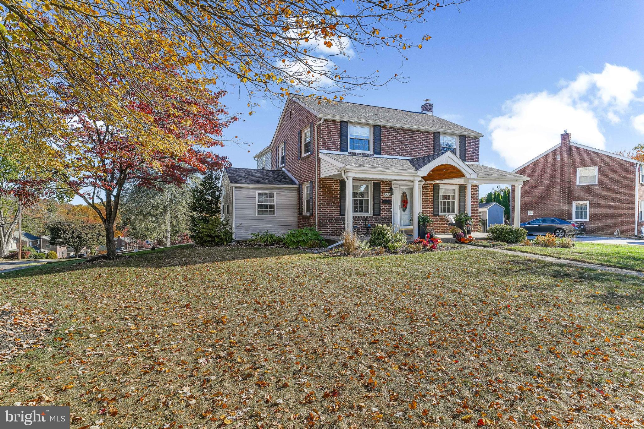 565 Kirk Road Springfield, PA 19064 - Photo 3 of 41 a front view of a house with a yard