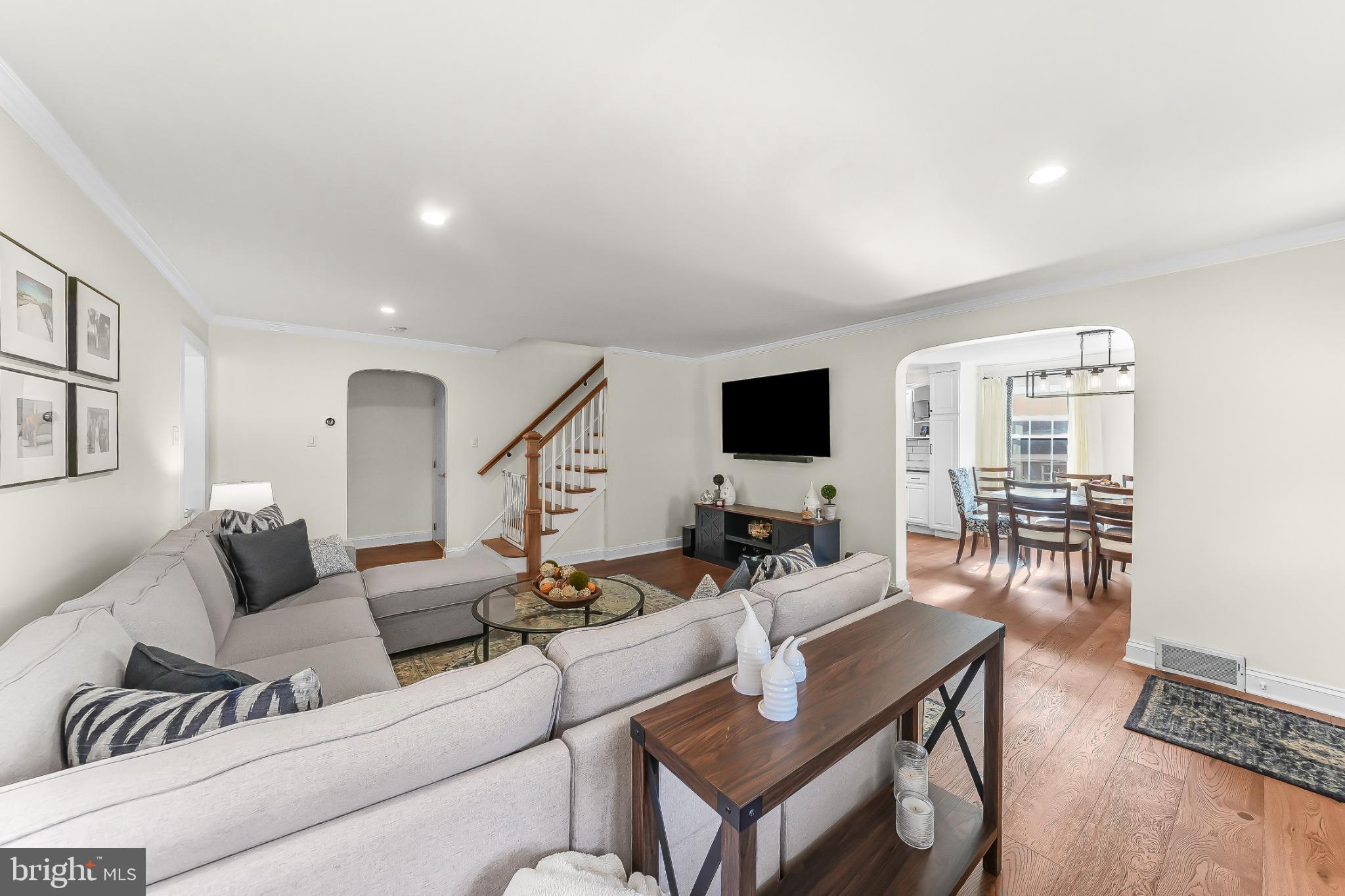 565 Kirk Road Springfield, PA 19064 - Photo 10 of 41 a living room with furniture and a flat screen tv