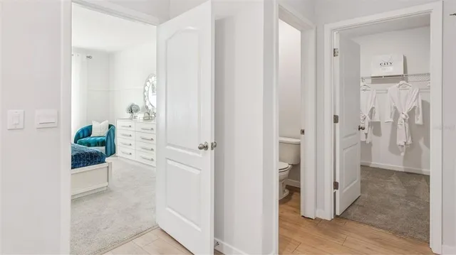 a balcony with furniture and a garden