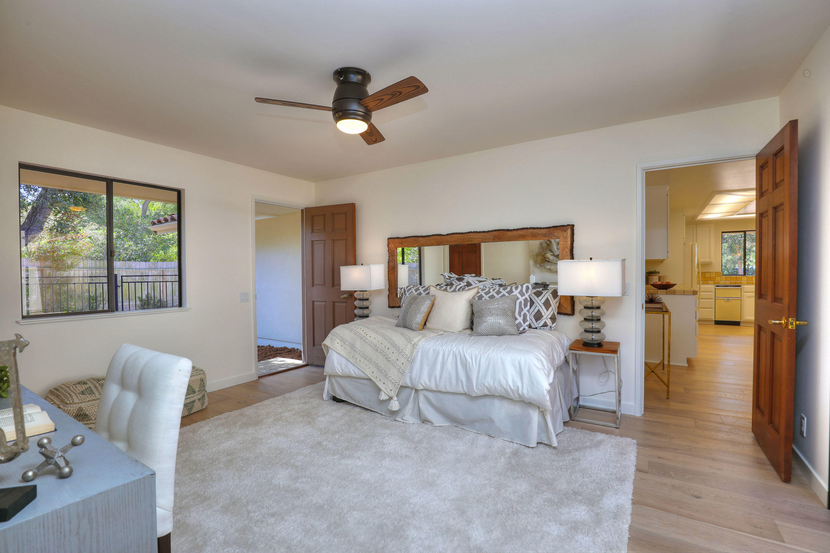 1674 Franceschi Road Santa Barbara, CA 93103 - Photo 18 of 25 a bedroom with a bed and wooden floor