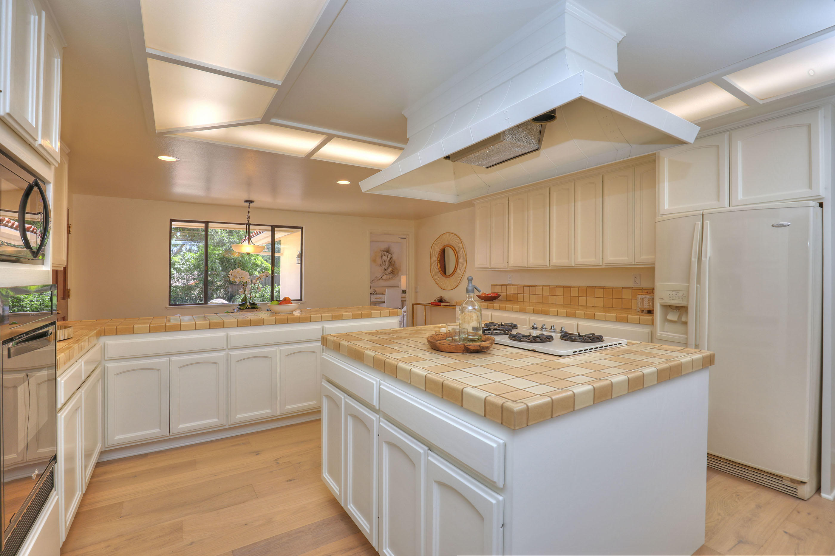1674 Franceschi Road Santa Barbara, CA 93103 - Photo 7 of 25 a kitchen with stainless steel appliances granite countertop a sink stove and refrigerator