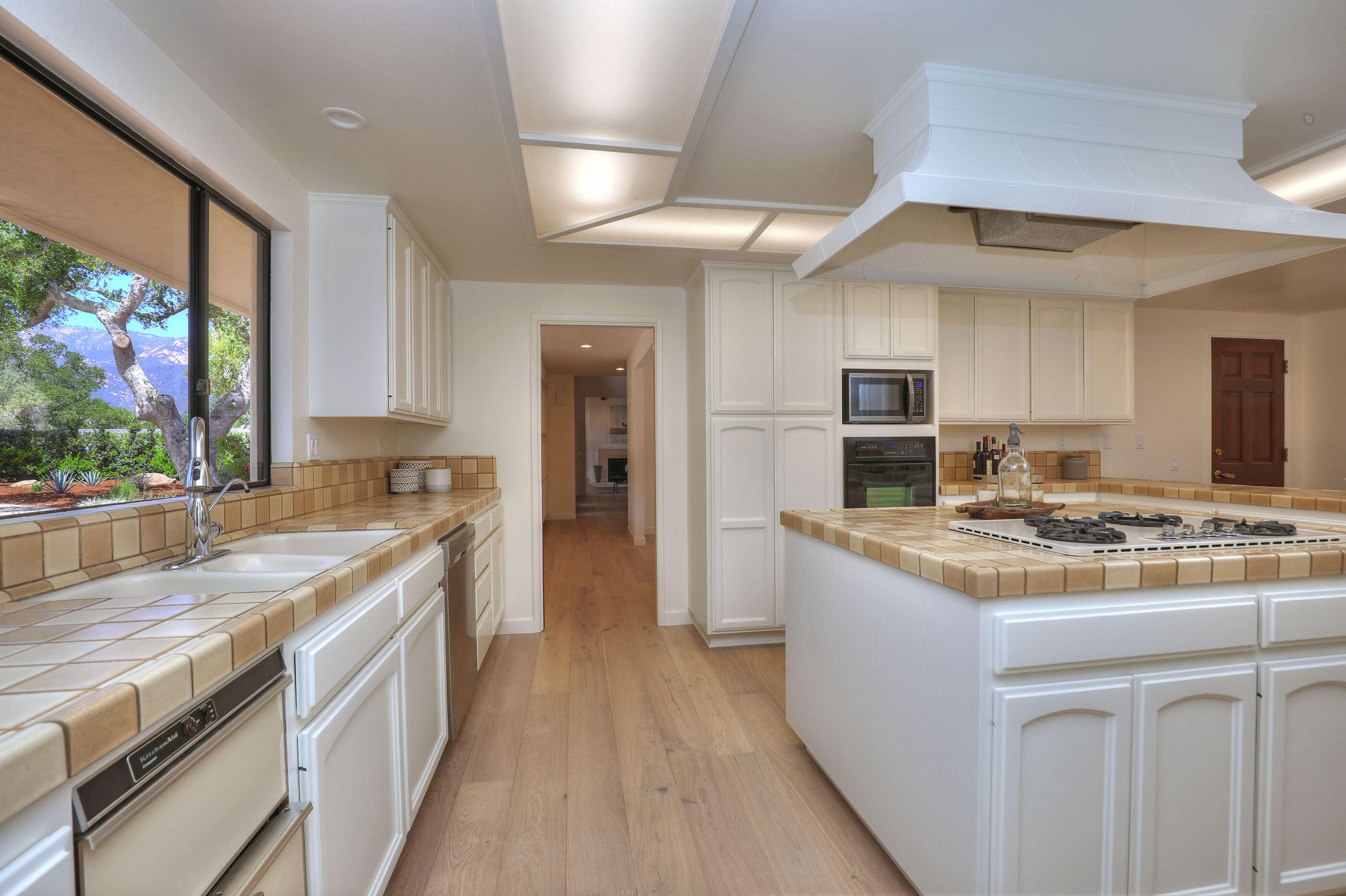 1674 Franceschi Road Santa Barbara, CA 93103 - Photo 8 of 25 a kitchen with a stove and a sink