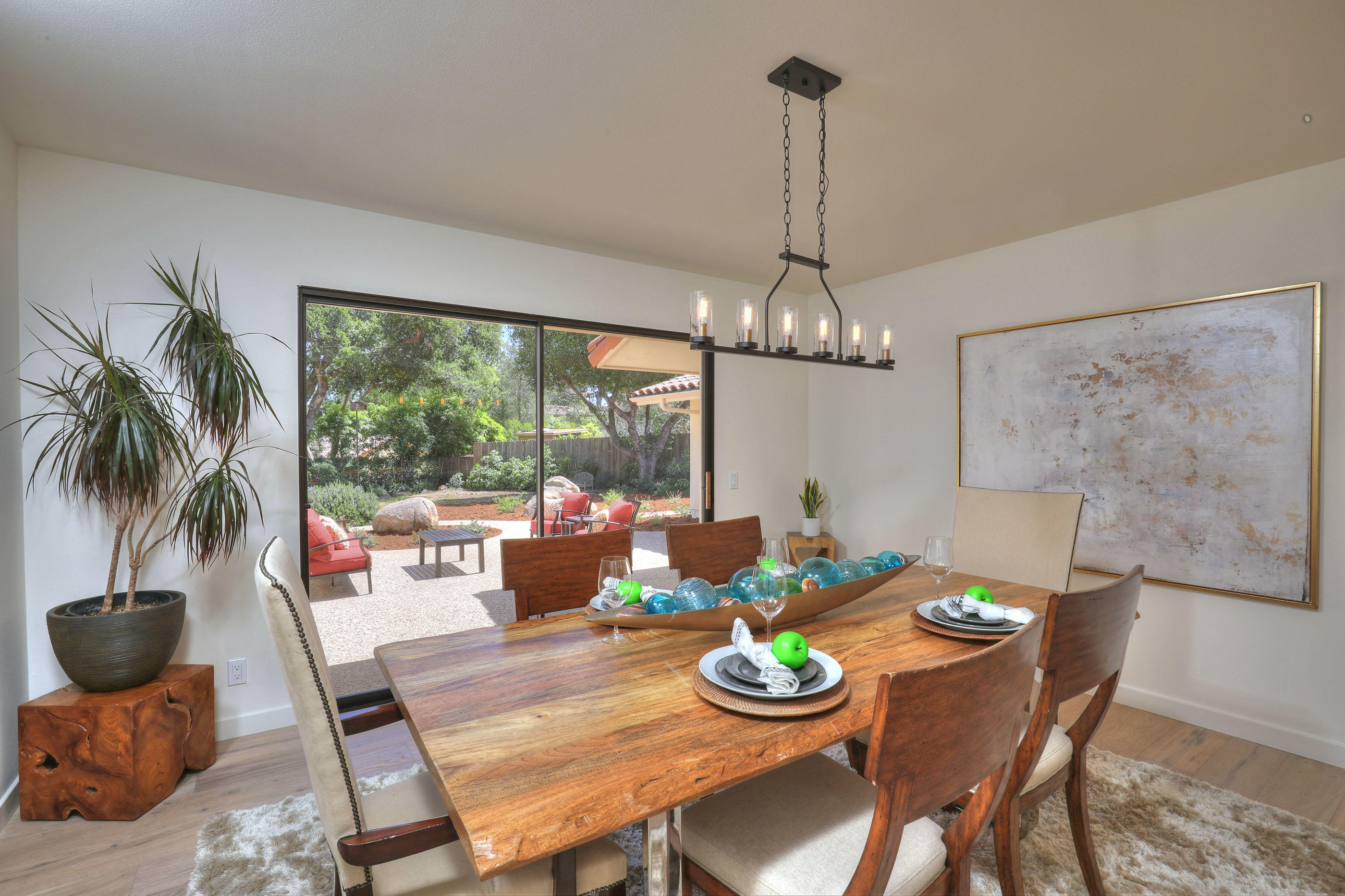 1674 Franceschi Road Santa Barbara, CA 93103 - Photo 10 of 25 a view of a dining room with furniture wooden floor and chandelier