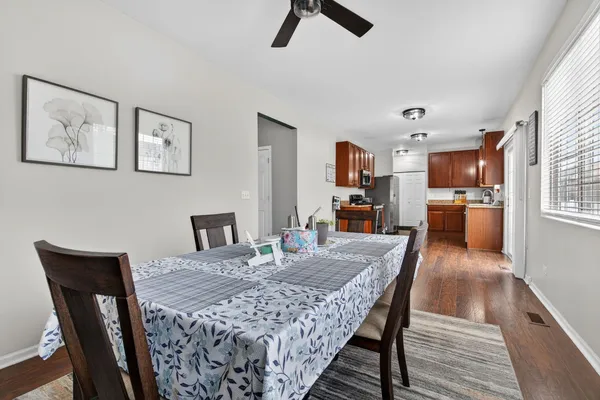 a view of a dining room with furniture