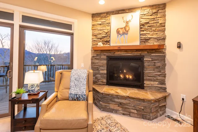 a view of a livingroom with furniture window and outside view