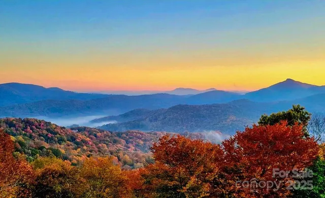 an aerial view of residential house and sandy dunes
