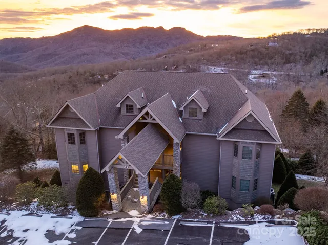 a view of a chairs and table in the patio