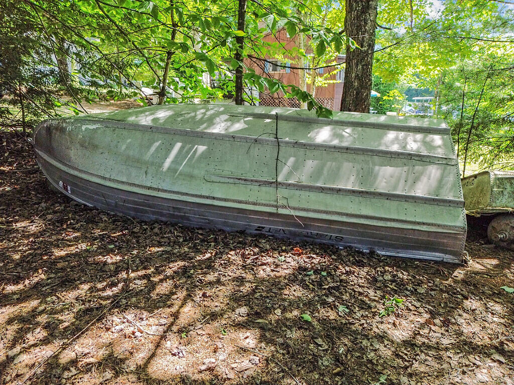 8 Horseshoe Road Winthrop, ME 04364 - Photo 41 of 44 41- Aluminum Boat, Motor in Locker