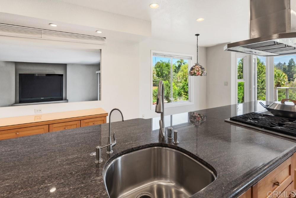 14040 Old Station Road Poway, CA 92064 - Photo 14 of 53 a kitchen with a sink and a large window