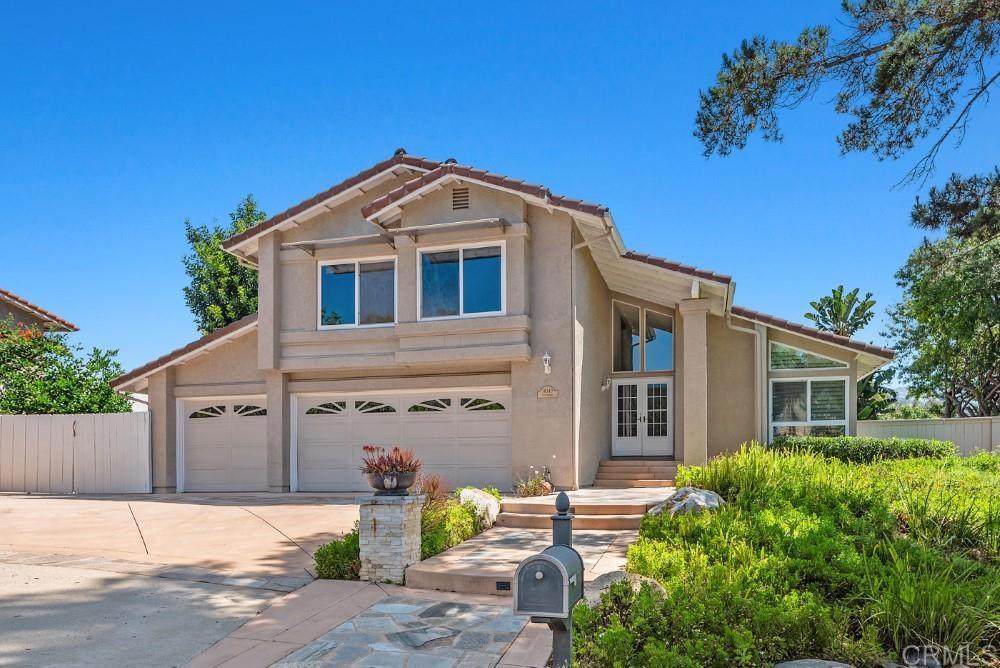 14040 Old Station Road Poway, CA 92064 - Photo 2 of 53 a front view of a house with a yard