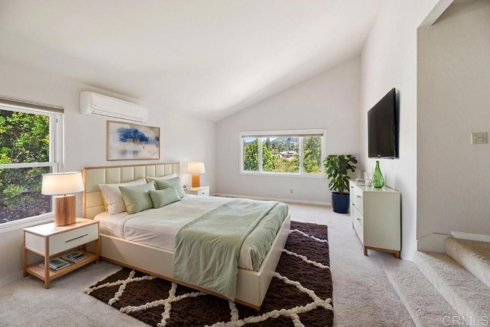 14040 Old Station Road Poway, CA 92064 - Photo 22 of 53 a bedroom with a bed and a couch