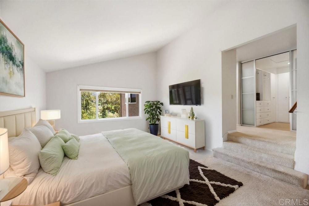 14040 Old Station Road Poway, CA 92064 - Photo 23 of 53 a bedroom with a bed and a flat screen tv