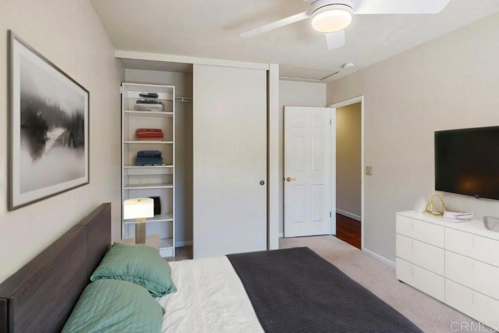 14040 Old Station Road Poway, CA 92064 - Photo 34 of 53 a bedroom with a bed and a flat screen tv