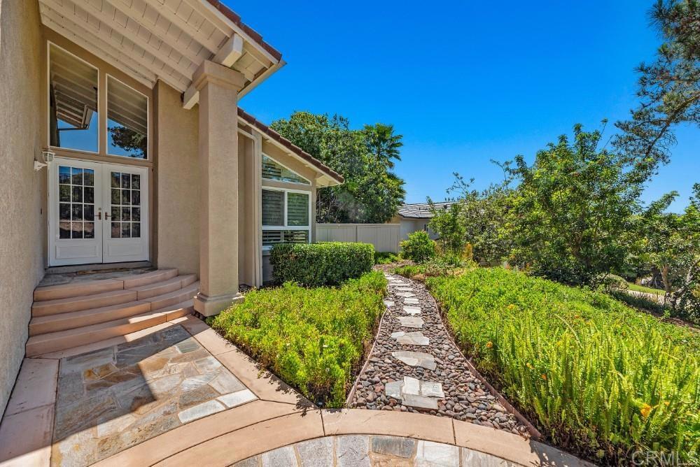 14040 Old Station Road Poway, CA 92064 - Photo 4 of 53 a view of a backyard with potted plants