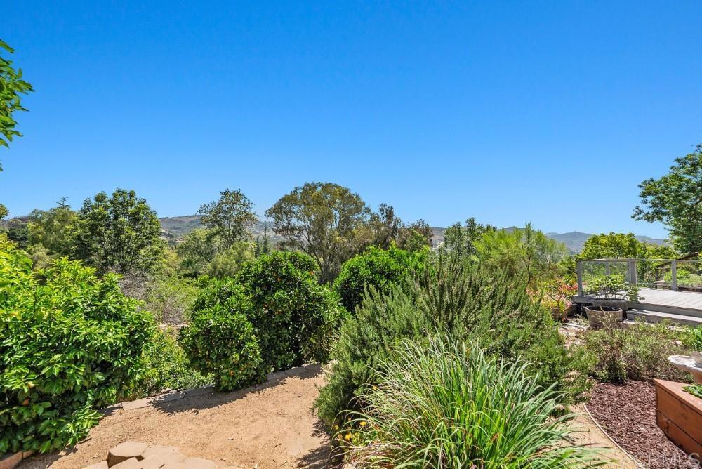 14040 Old Station Road Poway, CA 92064 - Photo 47 of 53 a view of a large yard with lots of green space