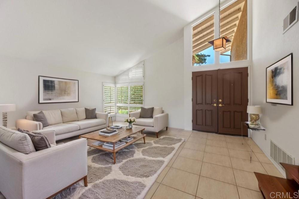 14040 Old Station Road Poway, CA 92064 - Photo 5 of 53 a living room with furniture and a window