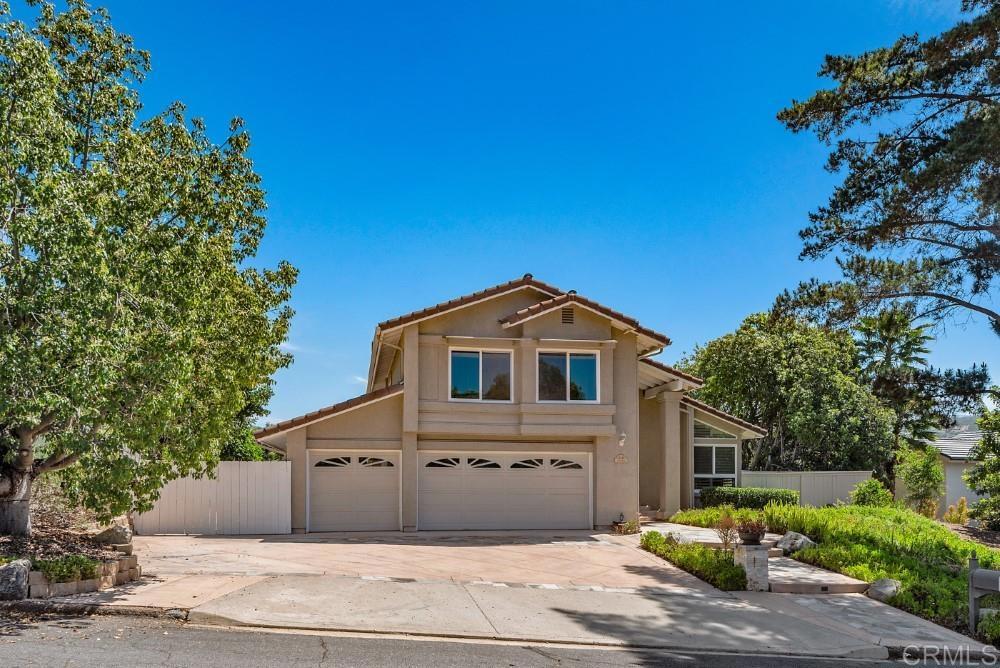 14040 Old Station Road Poway, CA 92064 - Photo 52 of 53 a front view of a house with a garden