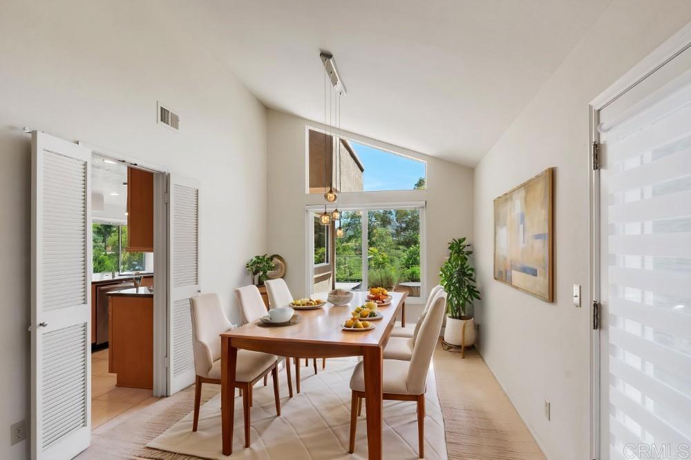 14040 Old Station Road Poway, CA 92064 - Photo 7 of 53 a view of a dining room with furniture window and outside view