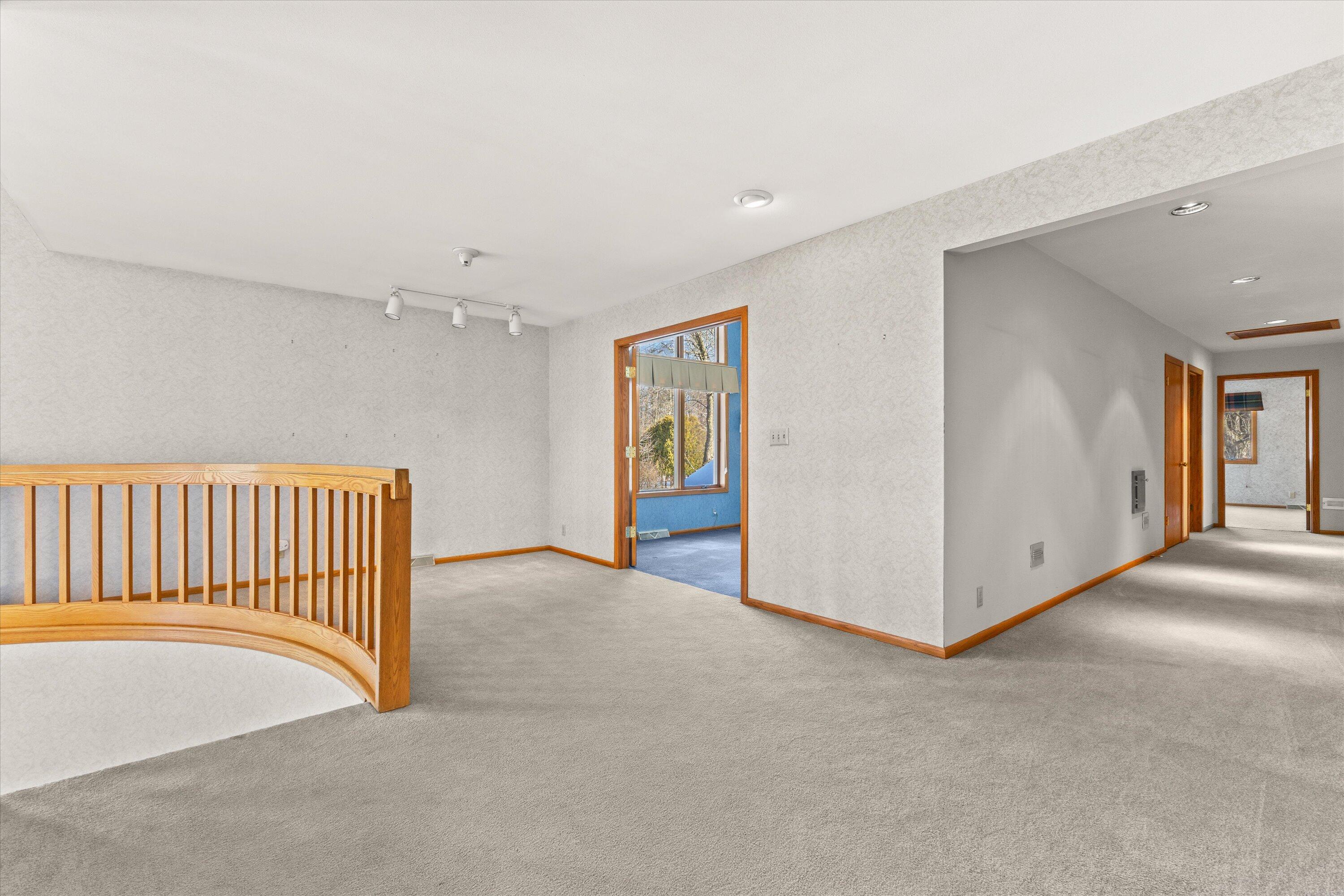 301 West Ravine Baye Road Bayside, WI 53217 - Photo 44 of 86 View to Bedroom 2 and Hallway