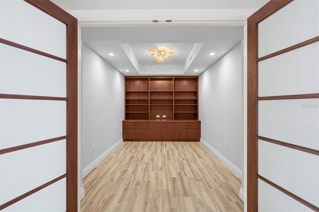800 Collany Road, Unit 302 St. Petersburg, FL 33715 - Photo 25 of 66 a view of entryway with wooden floor