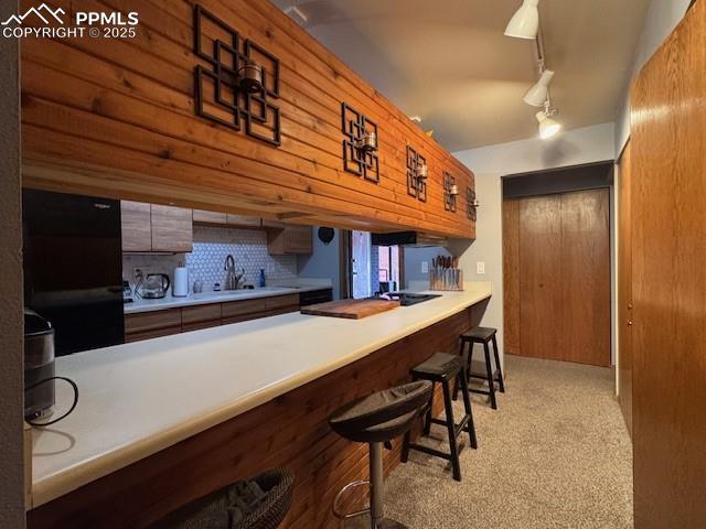 31 East Boulder Street Colorado Springs, CO 80903 - Photo 13 of 17 a room with furniture and a bookshelf