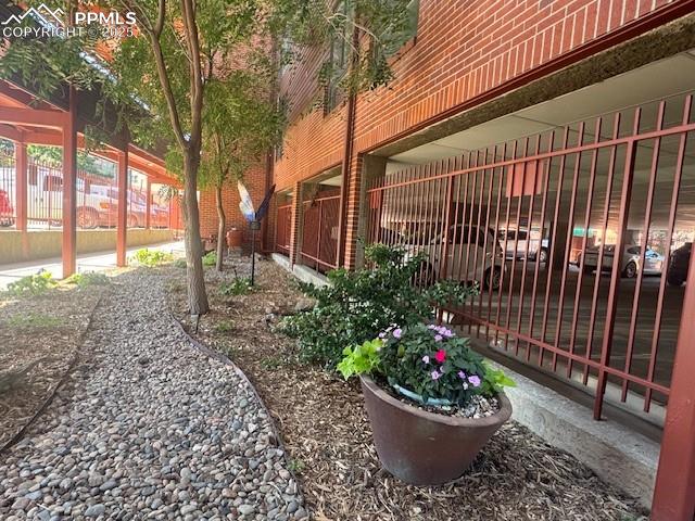 31 East Boulder Street Colorado Springs, CO 80903 - Photo 4 of 17 a view of a backyard with garden and plants