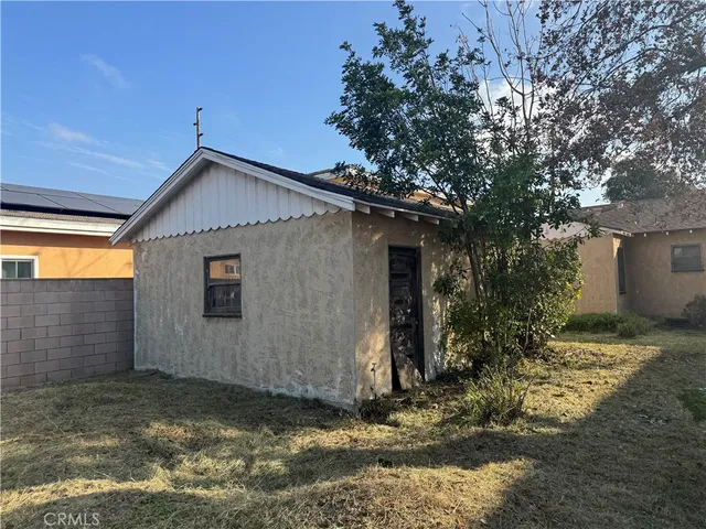 a house with trees in front of it