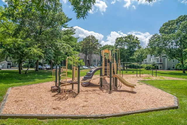 a view of a park with swings