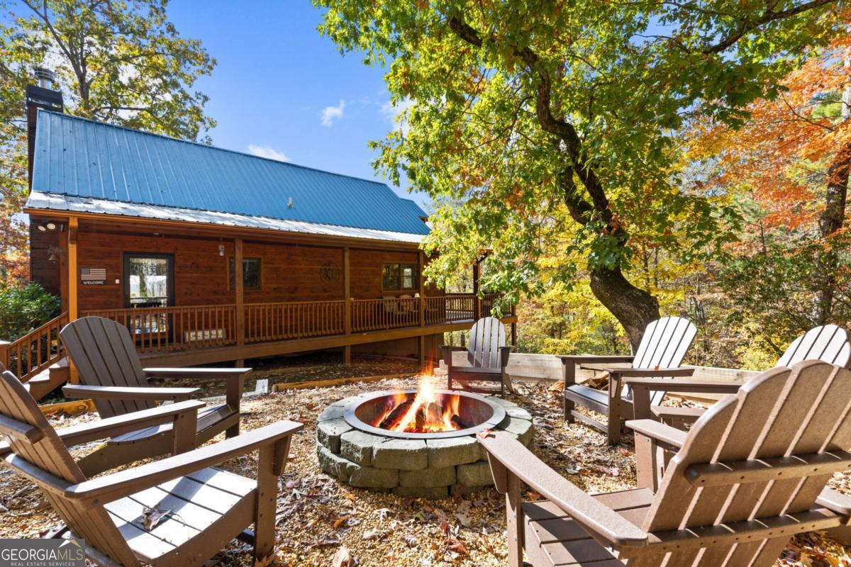 a backyard of a house with seating space