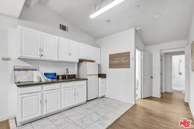 $2,349,000 | 4669 West Olympic Boulevard, Los Angeles, CA 90019
