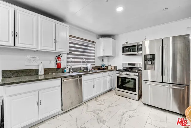 $2,349,000 | 4669 West Olympic Boulevard, Los Angeles, CA 90019