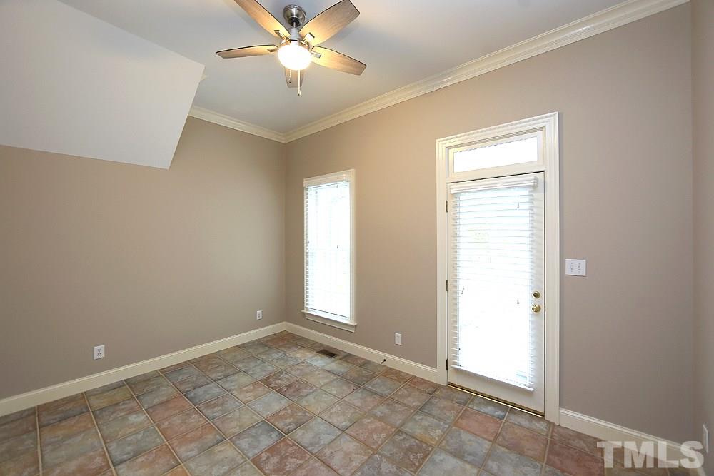 8617 Cold Springs Road Raleigh, NC 27615 - Photo 17 of 30 Door to the wrap-around-porch and close to the kitchen.