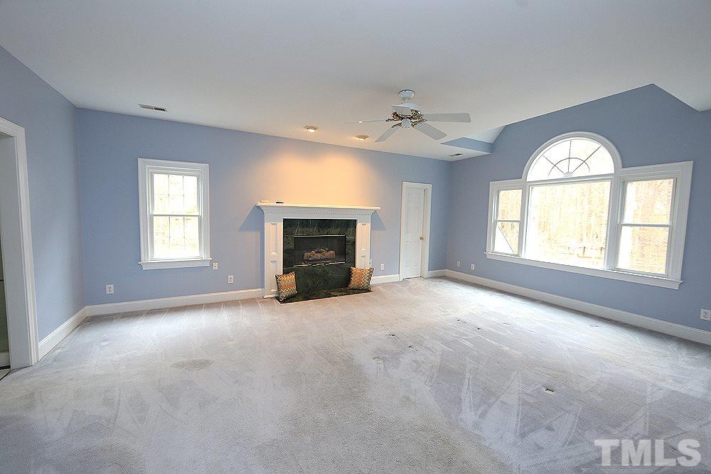 8617 Cold Springs Road Raleigh, NC 27615 - Photo 19 of 30 Large room, another fireplace, and huge closet.