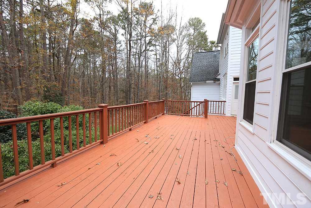 8617 Cold Springs Road Raleigh, NC 27615 - Photo 24 of 30 Lots of space for entertaining. Below this area is a play space for the younger set.