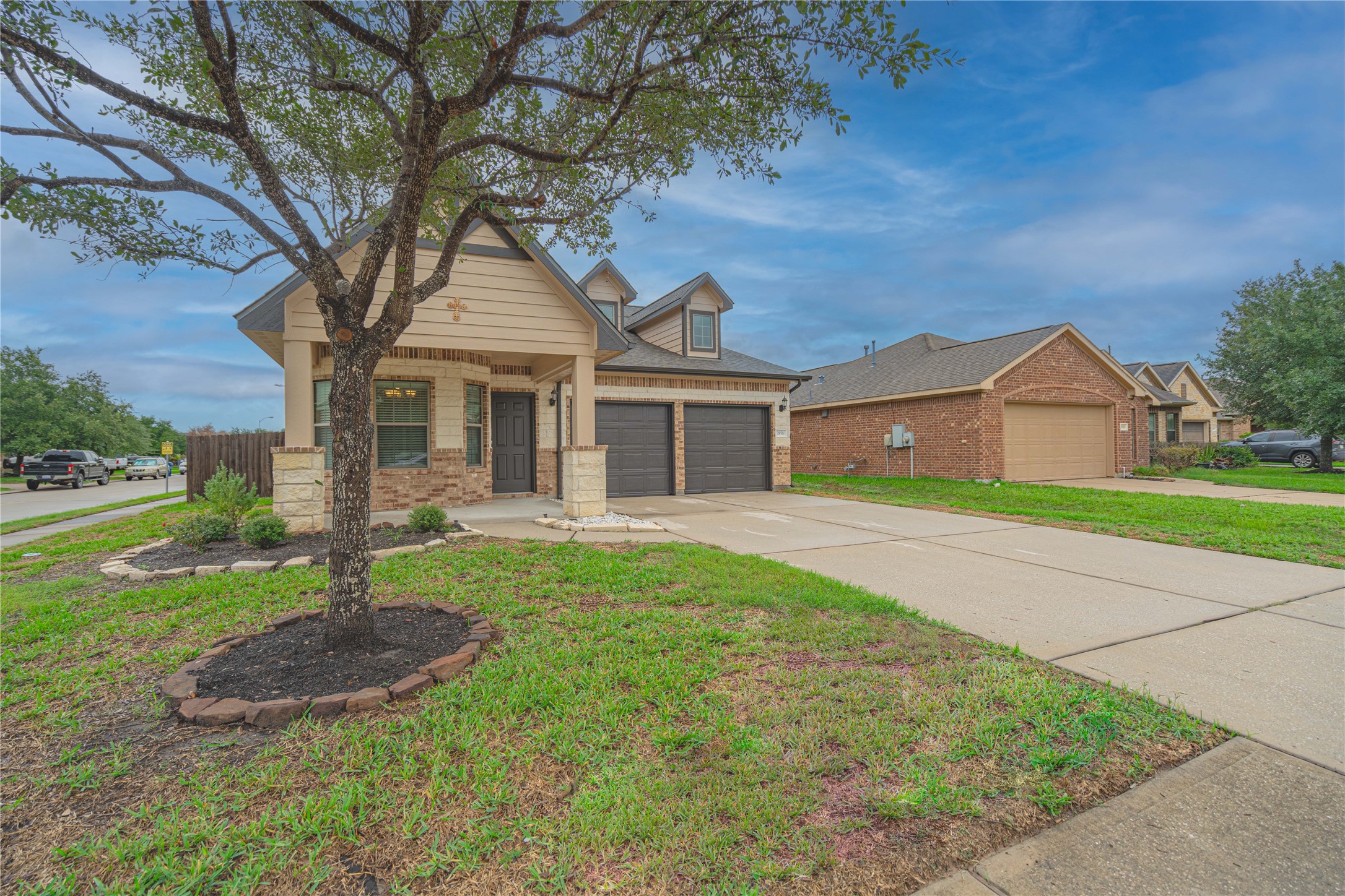 28514 Lockeridge Springs Drive Spring, TX 77386 - Photo 2 of 35 a front view of a house with yard and green space