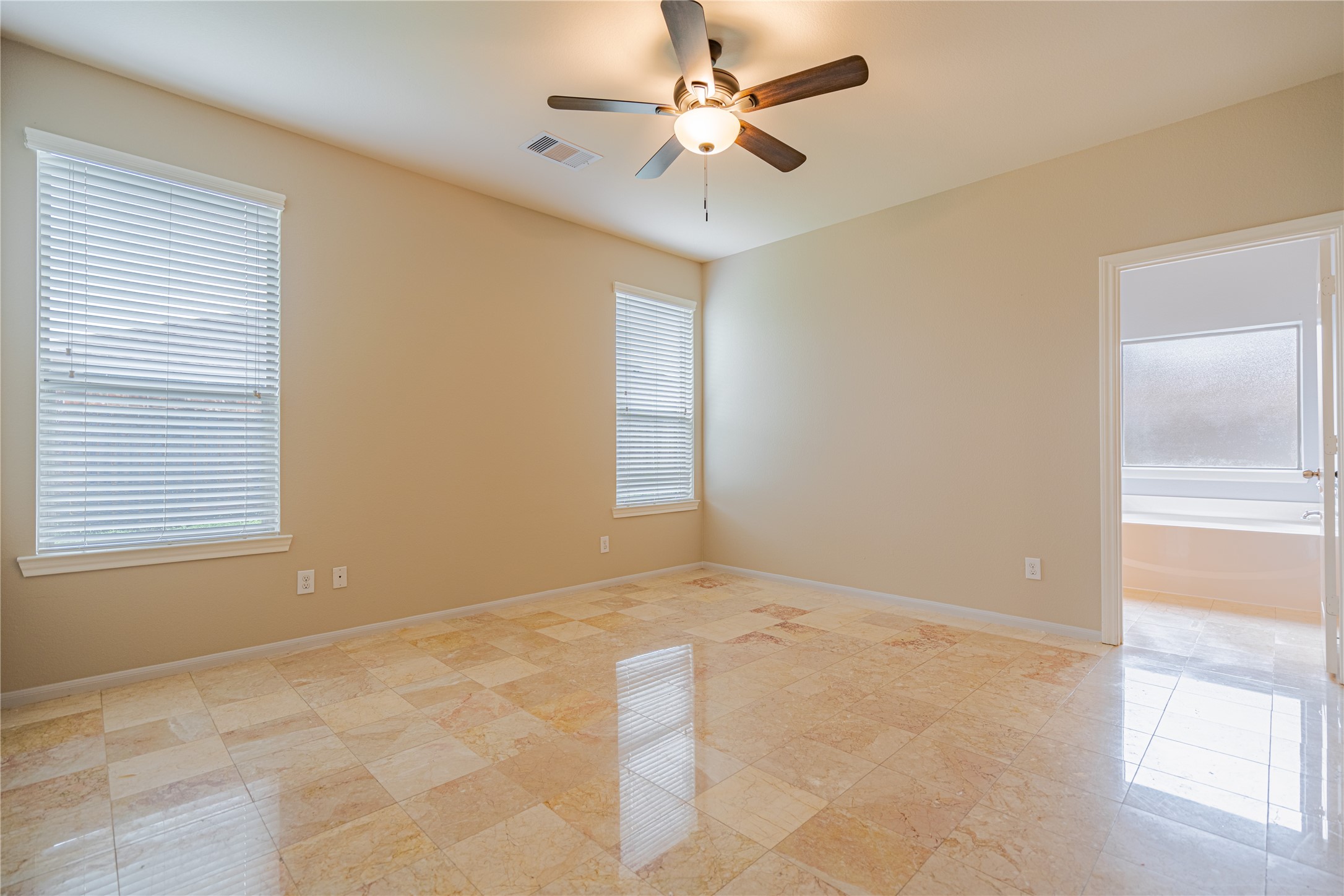 28514 Lockeridge Springs Drive Spring, TX 77386 - Photo 22 of 35 a view of an empty room with a window