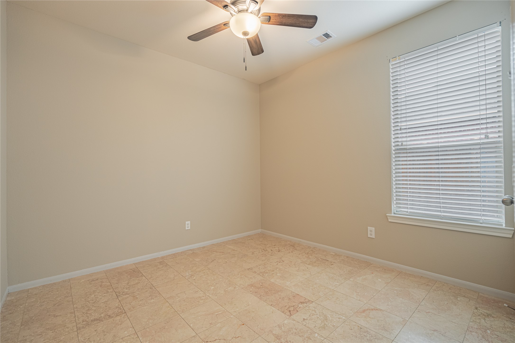 28514 Lockeridge Springs Drive Spring, TX 77386 - Photo 26 of 35 an empty room with a window