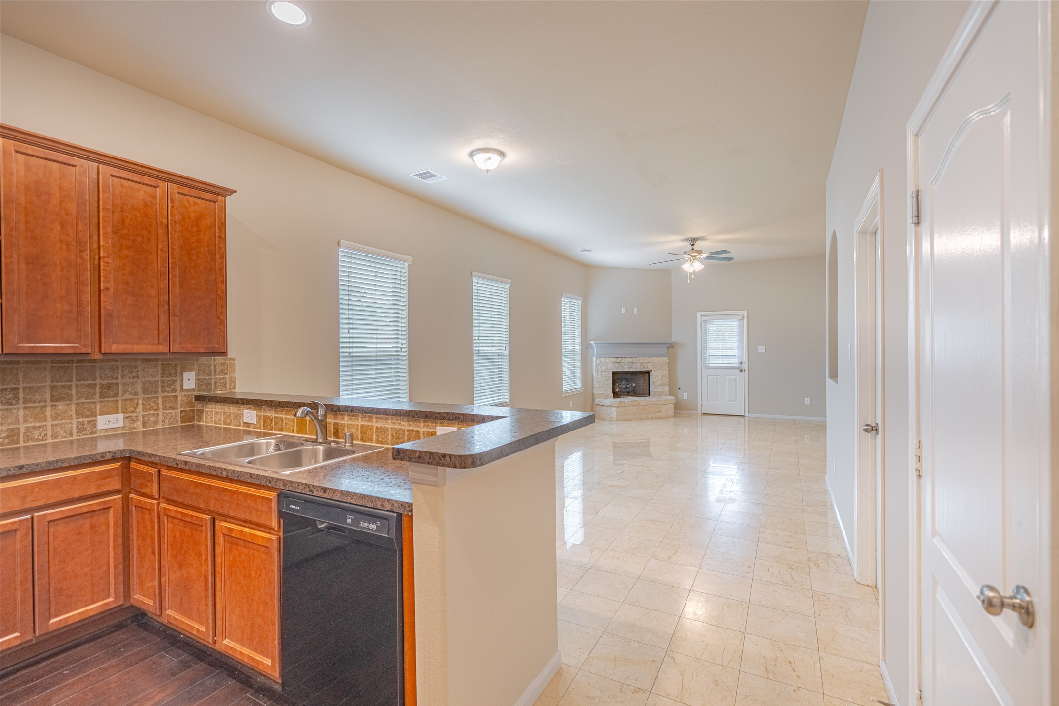 28514 Lockeridge Springs Drive Spring, TX 77386 - Photo 5 of 35 a view of a kitchen with a sink and cabinets
