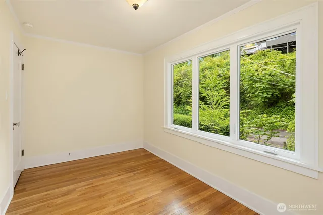 a view of a room that has a window in it