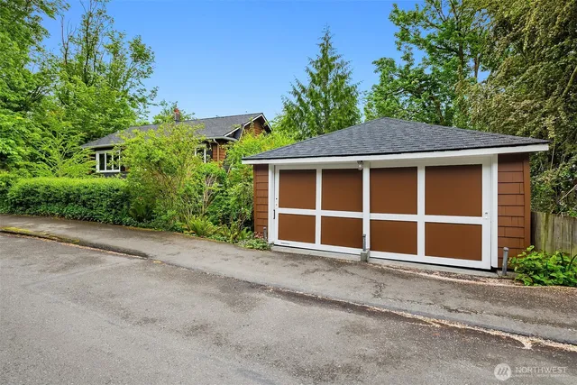 a house with trees in the background
