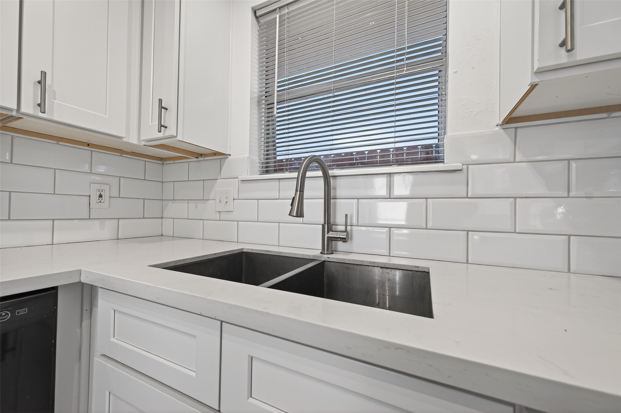 2603 Shady Bayou Lane Spring, TX 77373 - Photo 16 of 43 a kitchen with a sink and cabinets