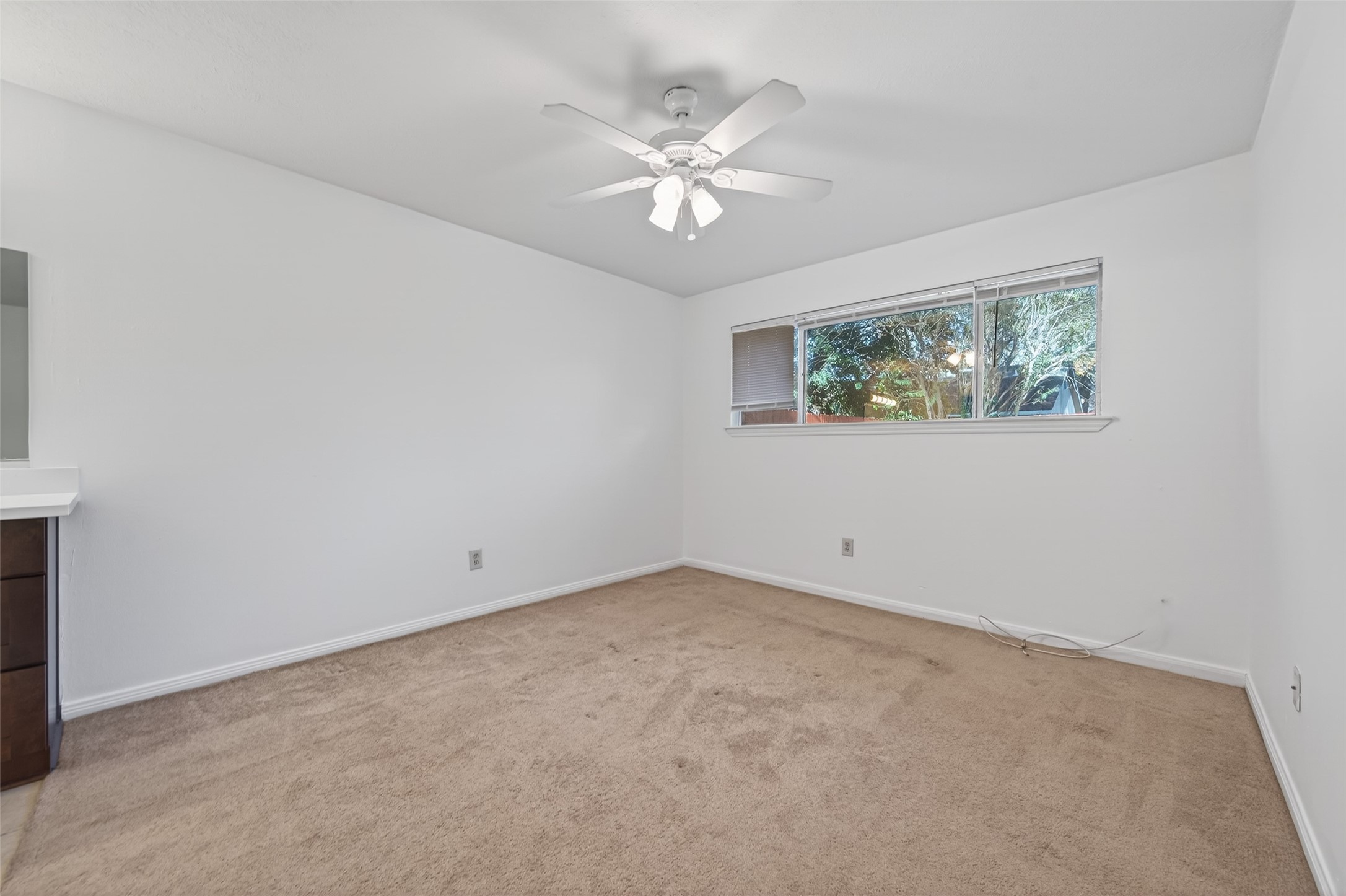 2603 Shady Bayou Lane Spring, TX 77373 - Photo 21 of 43 an view of an empty room with a window