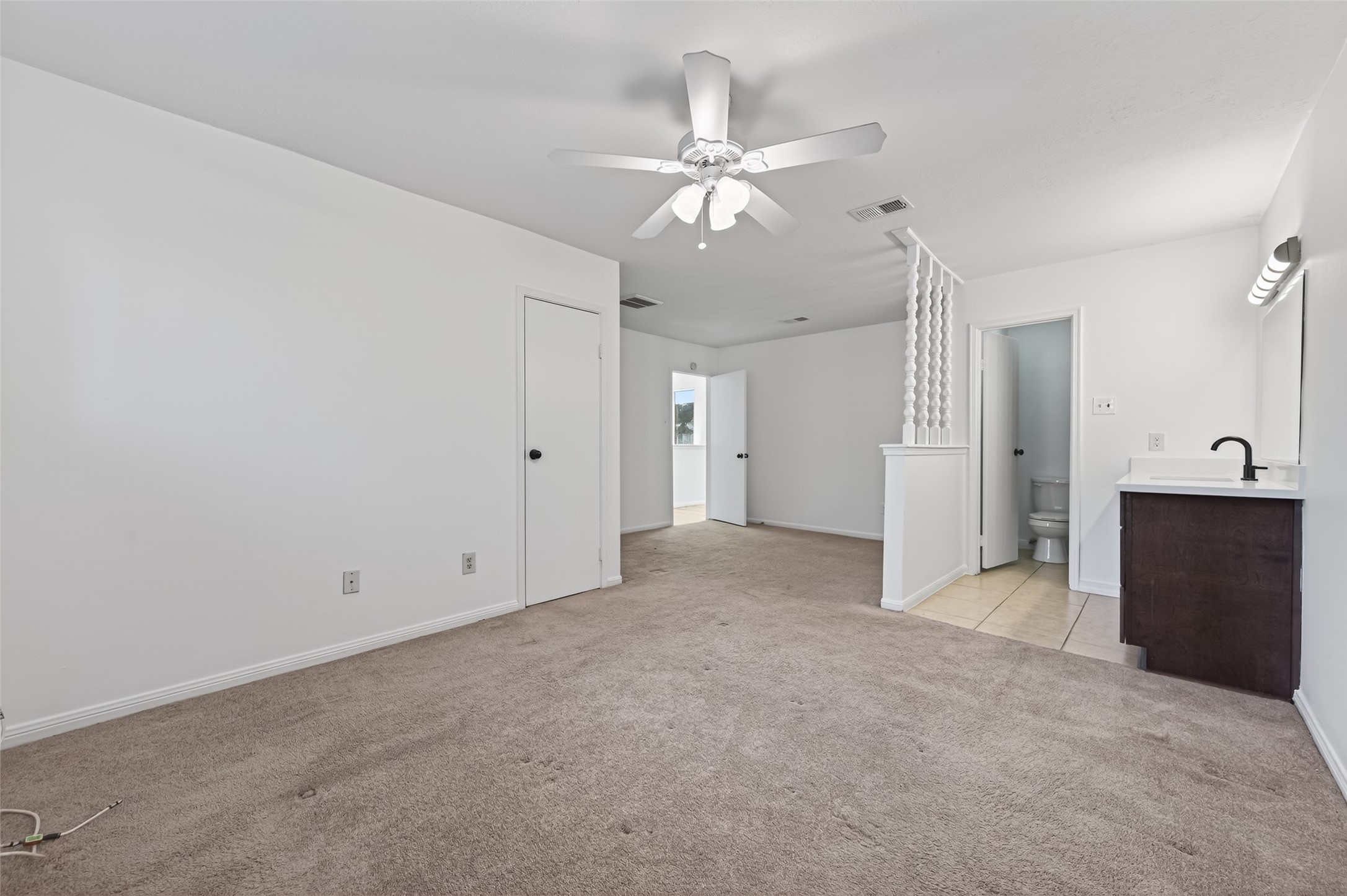 2603 Shady Bayou Lane Spring, TX 77373 - Photo 22 of 43 a view of a big room with chandelier fan and windows